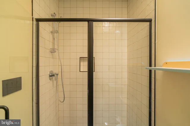 a bathroom with a bathtub and a sink