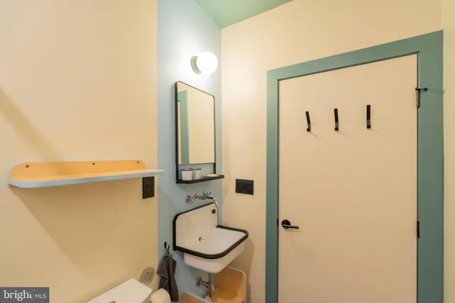 a front view of a house with a lounge chair