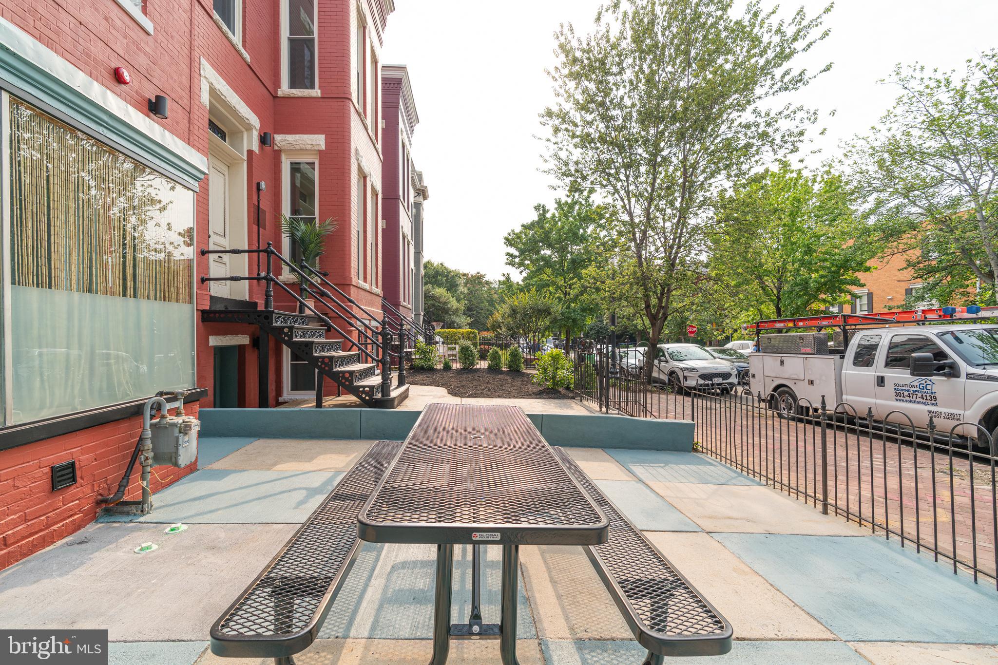 711 G Street Southeast Washington, DC 20003 - Photo 4 of 55 a view of a patio with couches and wooden floor