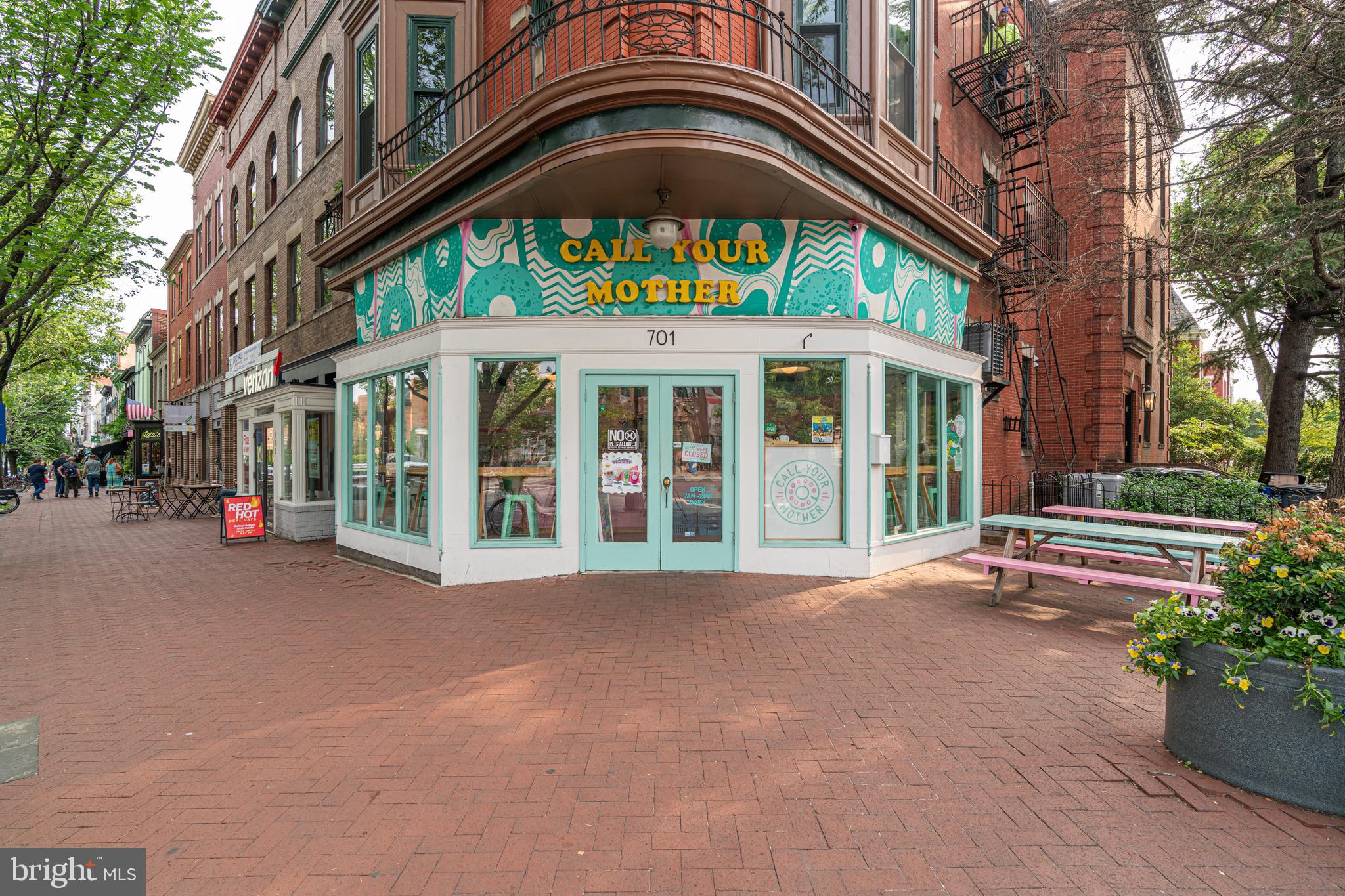 711 G Street Southeast Washington, DC 20003 - Photo 46 of 55 a front view of a building with a garden