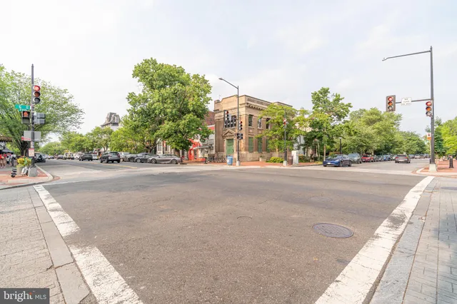 a view of a cars parked in front of a building