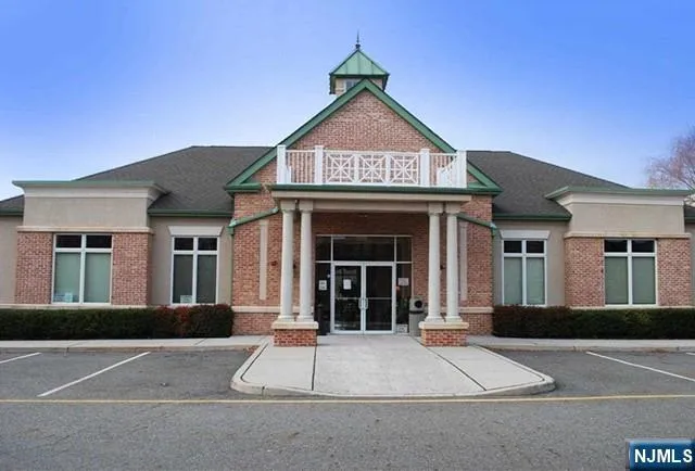a living room with furniture fireplace and a flat screen tv