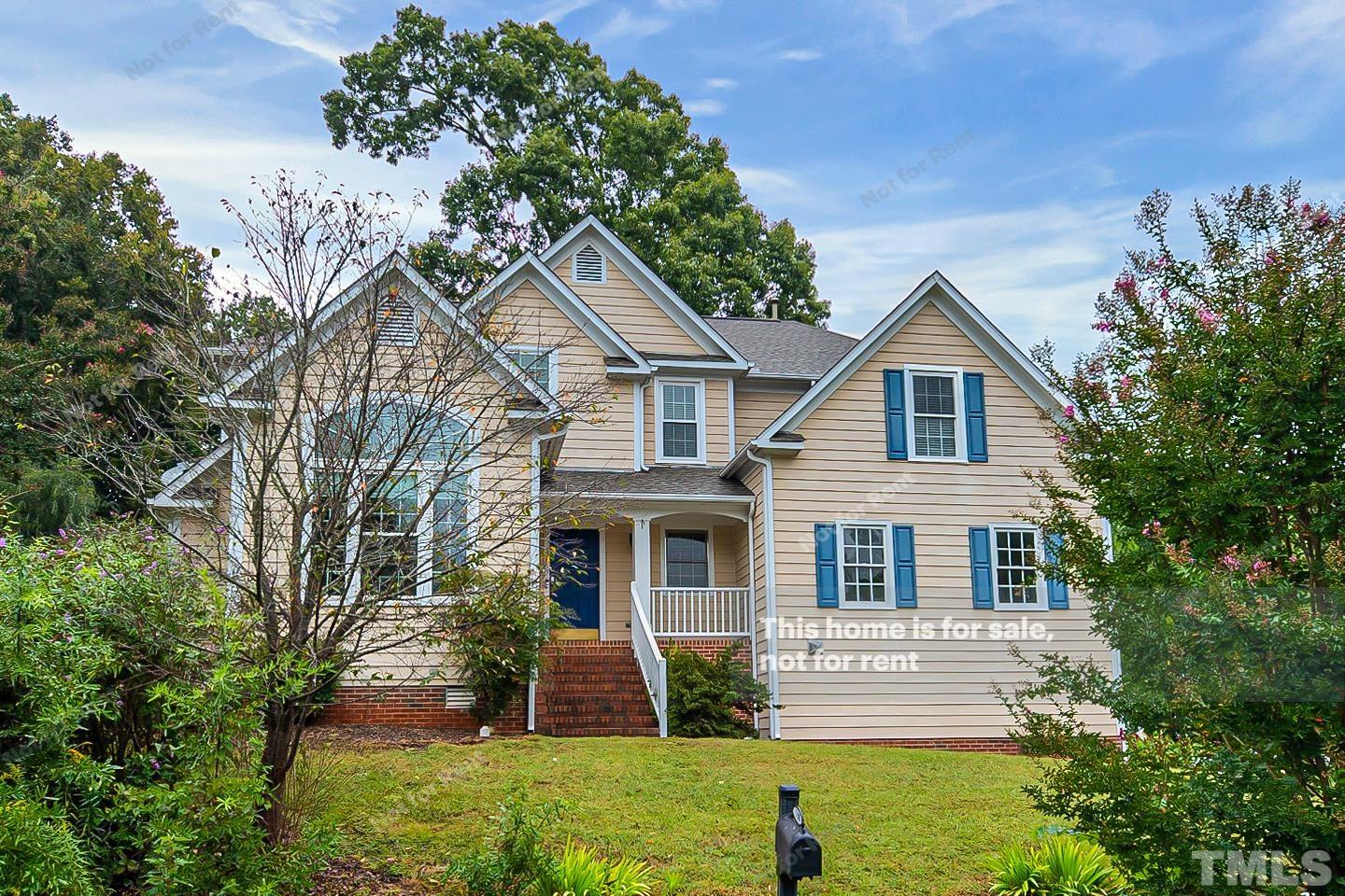 3300 Stone Castle Court Raleigh, NC 27613 - Photo 1 of 24 a front view of a house with garden