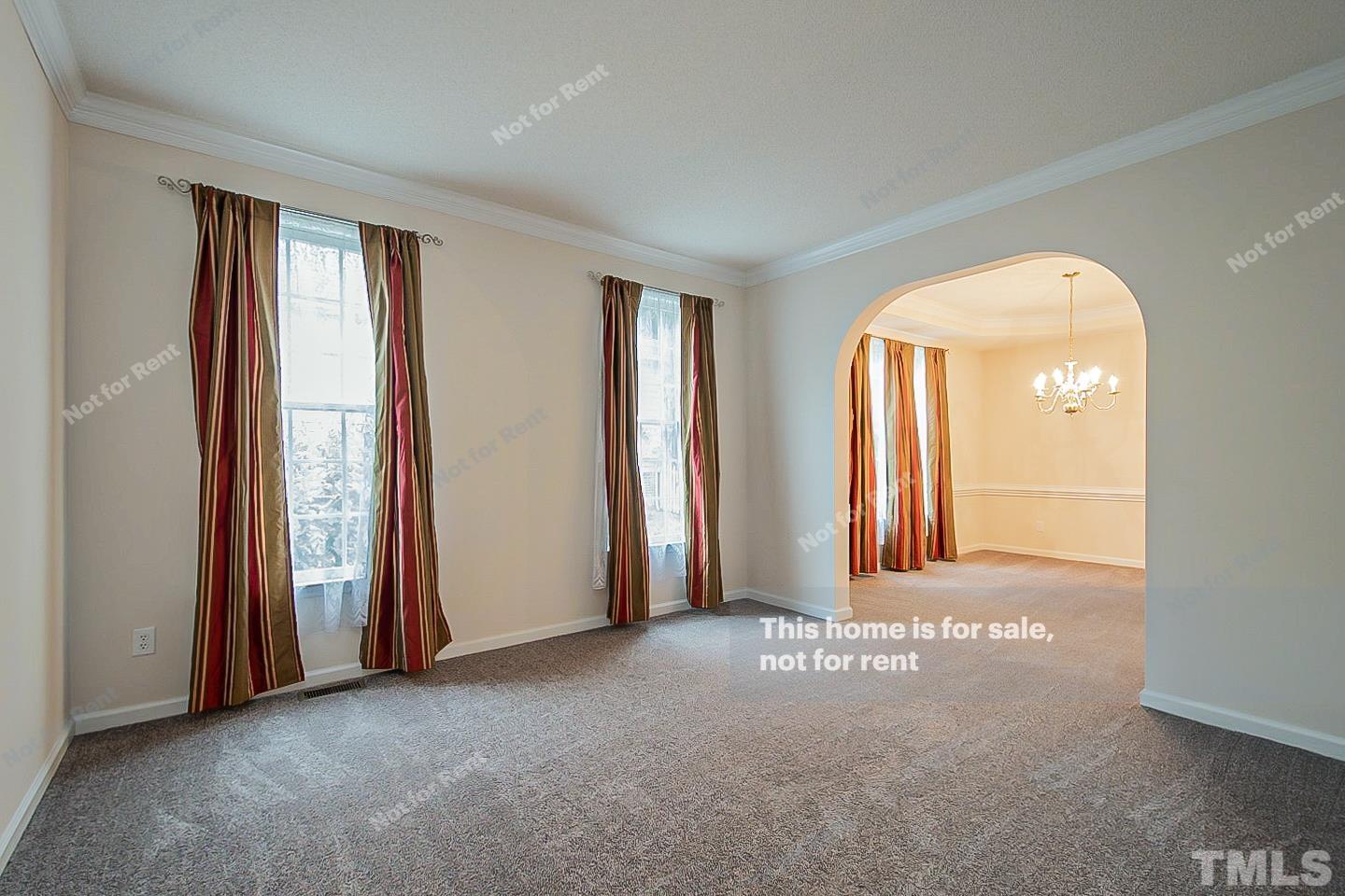 3300 Stone Castle Court Raleigh, NC 27613 - Photo 11 of 24 an empty room with windows