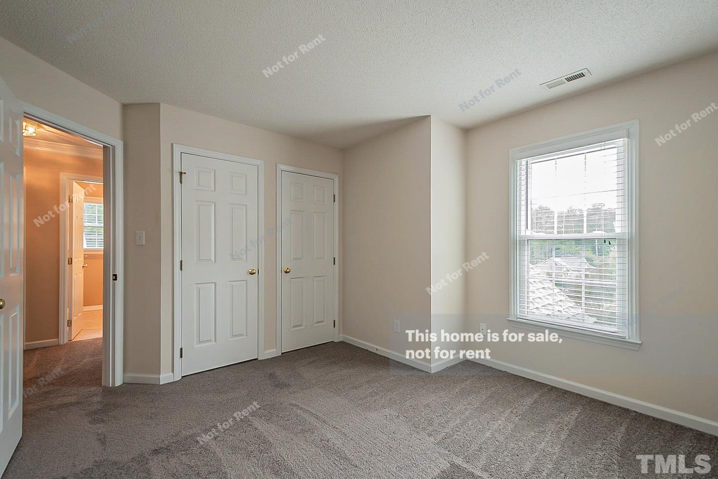 3300 Stone Castle Court Raleigh, NC 27613 - Photo 15 of 24 a view of an empty room with a window