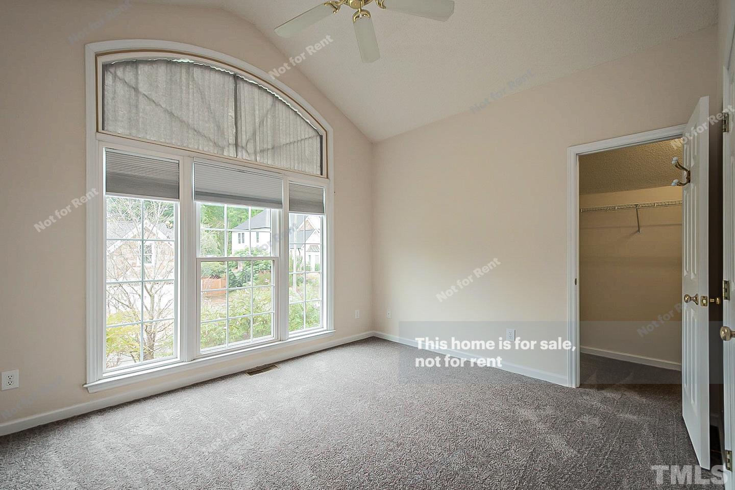 3300 Stone Castle Court Raleigh, NC 27613 - Photo 16 of 24 an empty room with a empty space and windows