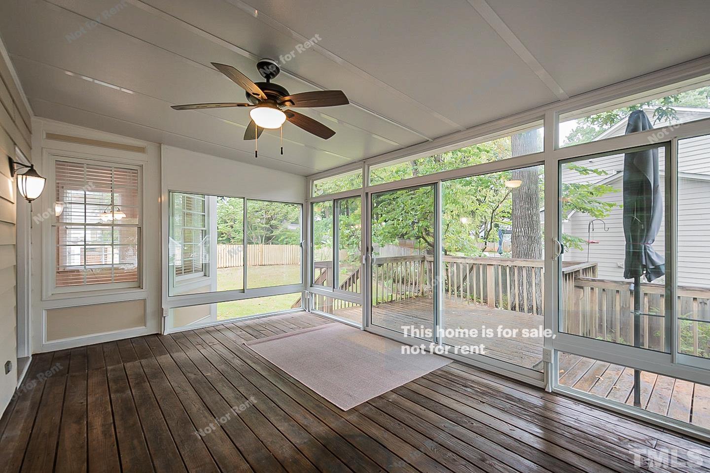 3300 Stone Castle Court Raleigh, NC 27613 - Photo 21 of 24 a view of a room with wooden floor and balcony