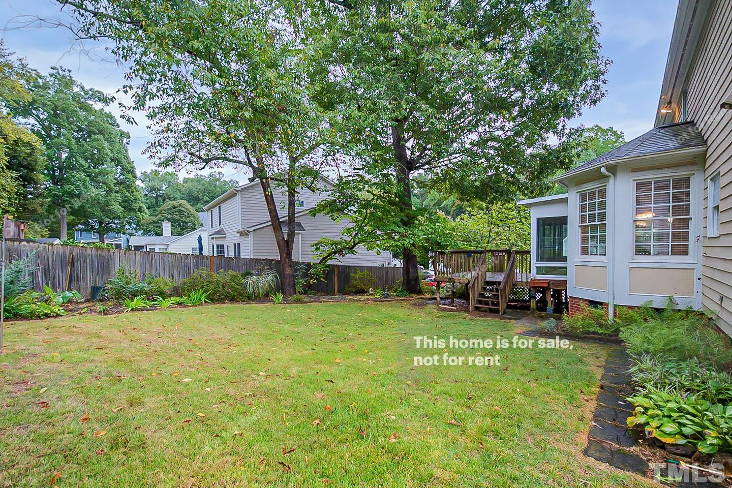 3300 Stone Castle Court Raleigh, NC 27613 - Photo 24 of 24 a view of a house with backyard porch and sitting area
