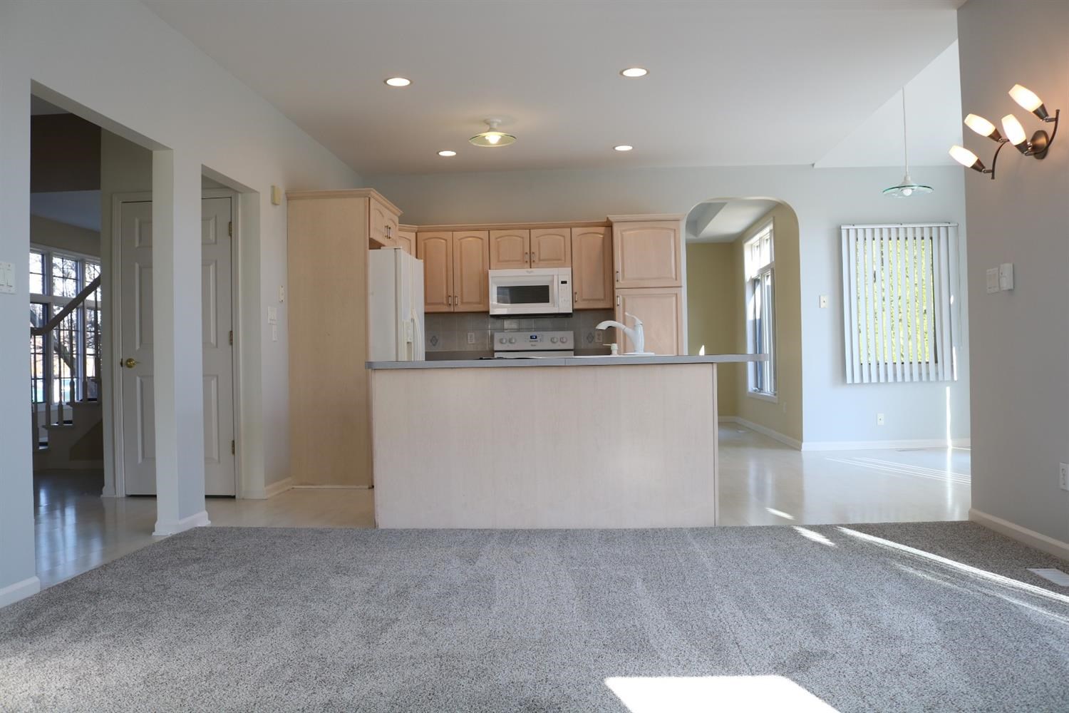 9939 Sequoia Lane Munster, IN 46321 - Photo 12 of 48 a view of a kitchen with a sink