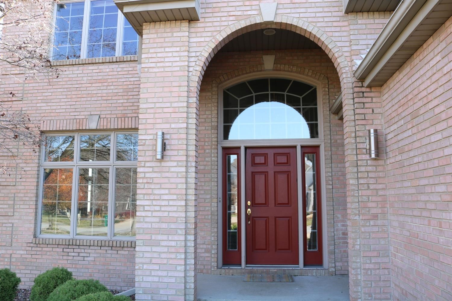 9939 Sequoia Lane Munster, IN 46321 - Photo 2 of 48 a front view of a house with a door