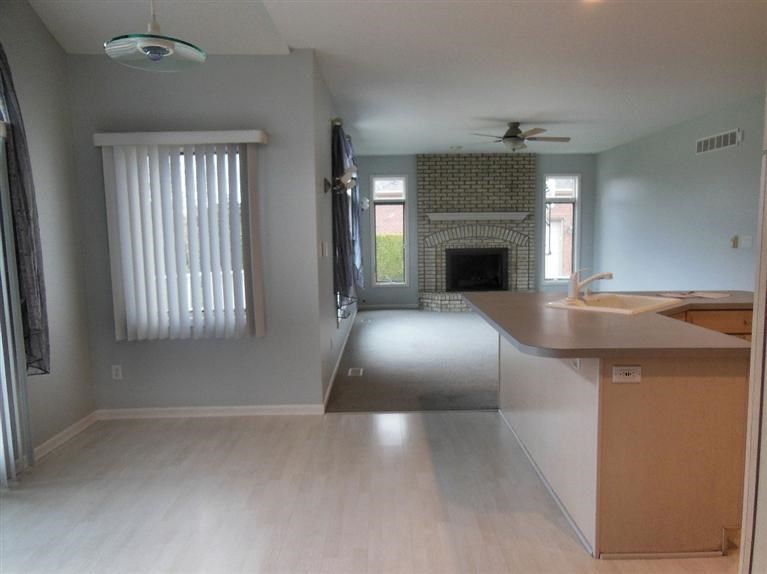 9939 Sequoia Lane Munster, IN 46321 - Photo 8 of 48 a view of a livingroom with a fireplace