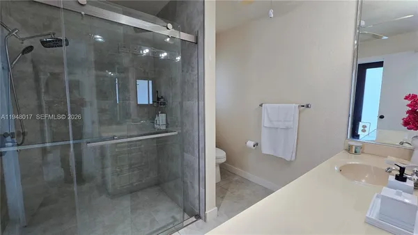 a bathroom with a bathtub and a sink