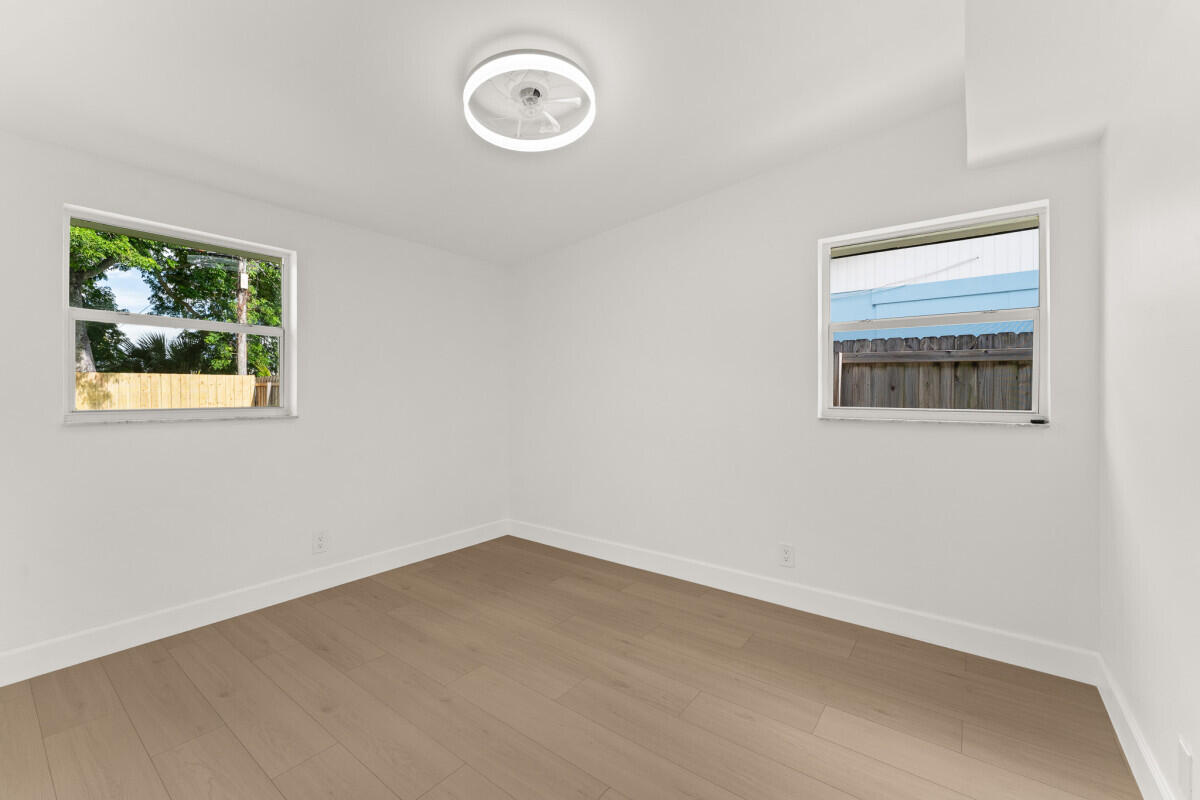 3797 Bahama Road Palm Beach Gardens, FL 33410 - Photo 25 of 27 an empty room with a window
