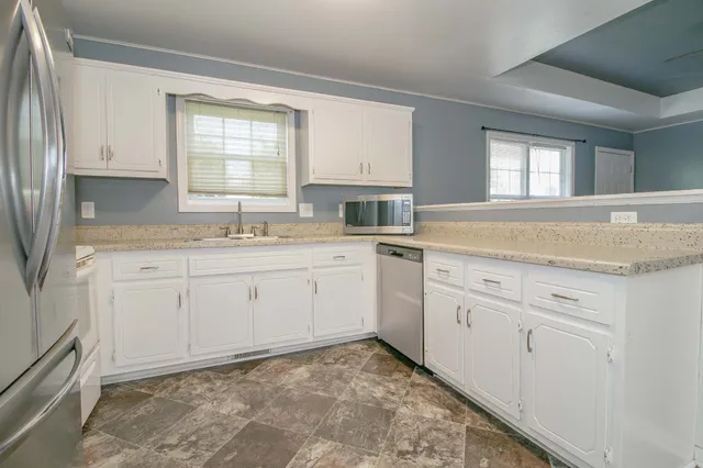 a view of a kitchen with sink