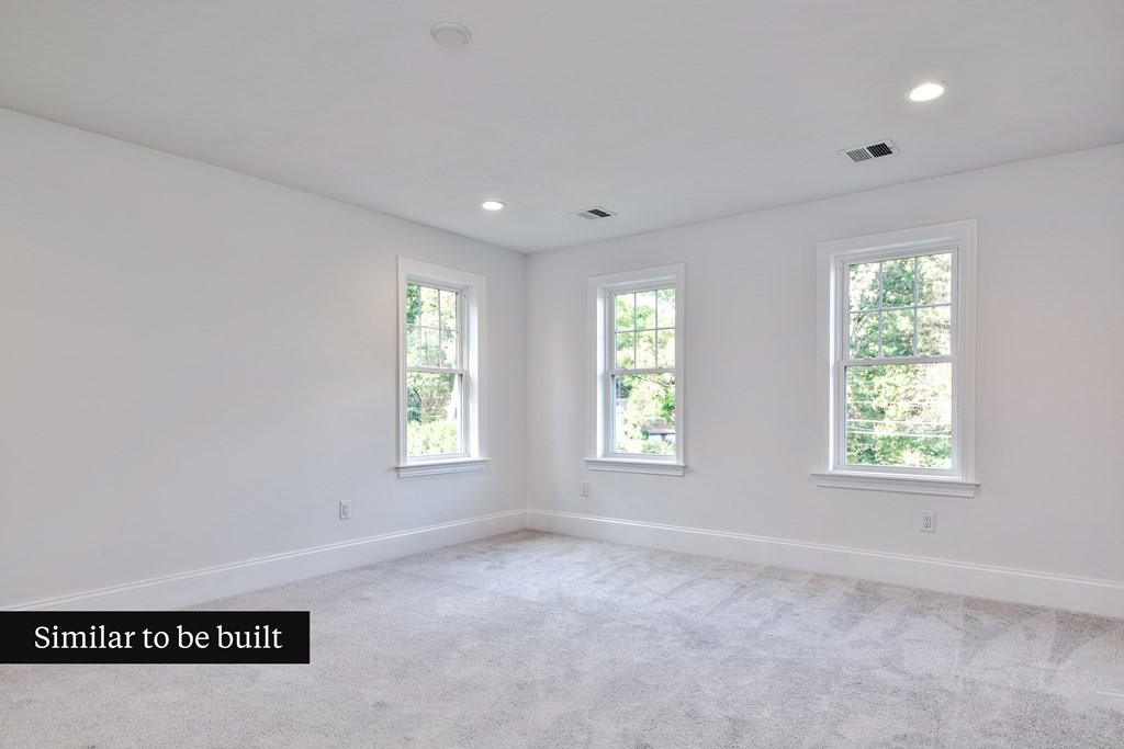 Lot 4 Arrow Path Natick, MA 01760 - Photo 13 of 18 an empty room with windows