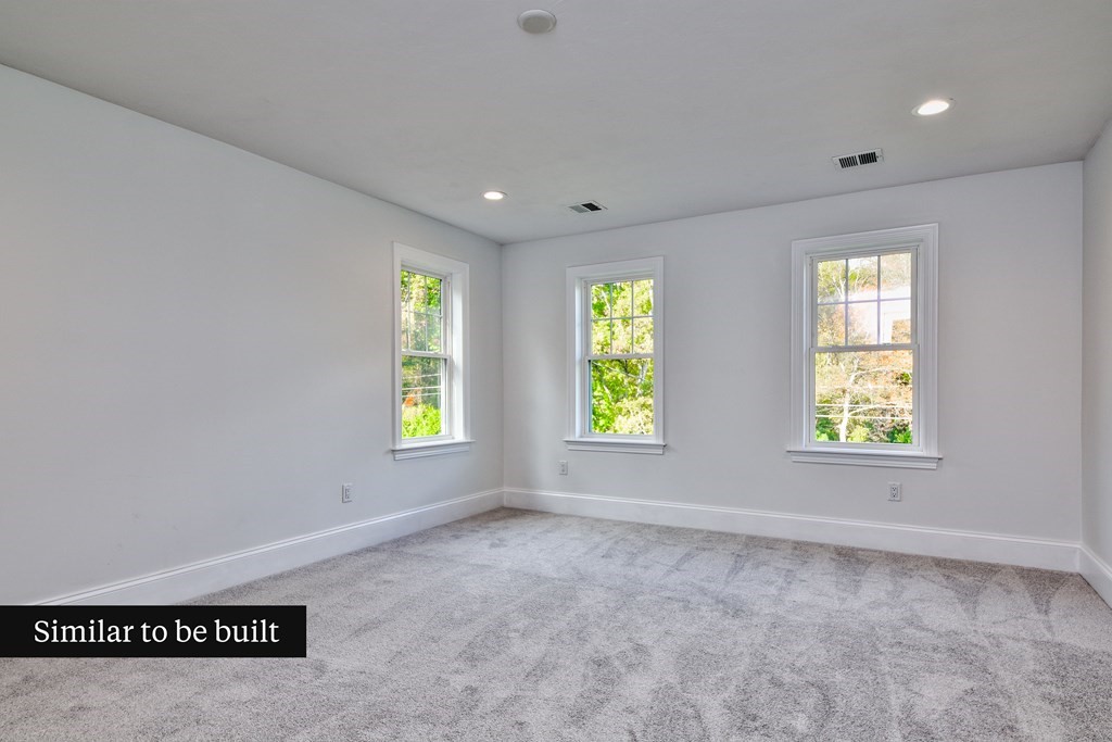 Lot 4 Arrow Path Natick, MA 01760 - Photo 16 of 18 a view of an empty room with window and stairs
