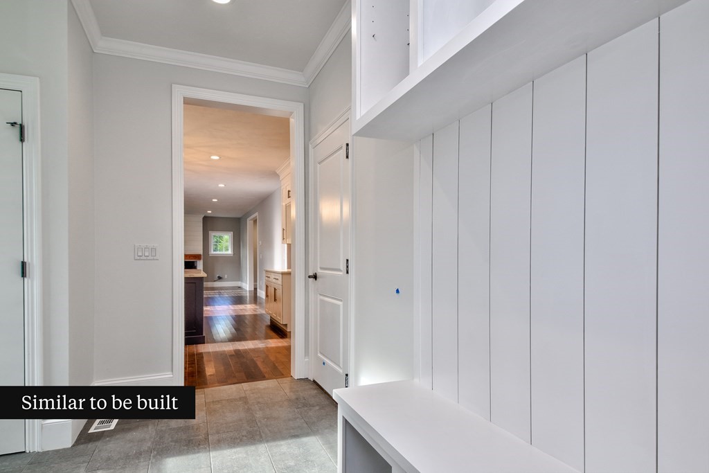 Lot 4 Arrow Path Natick, MA 01760 - Photo 10 of 18 a view of a hallway with wooden floor and living room