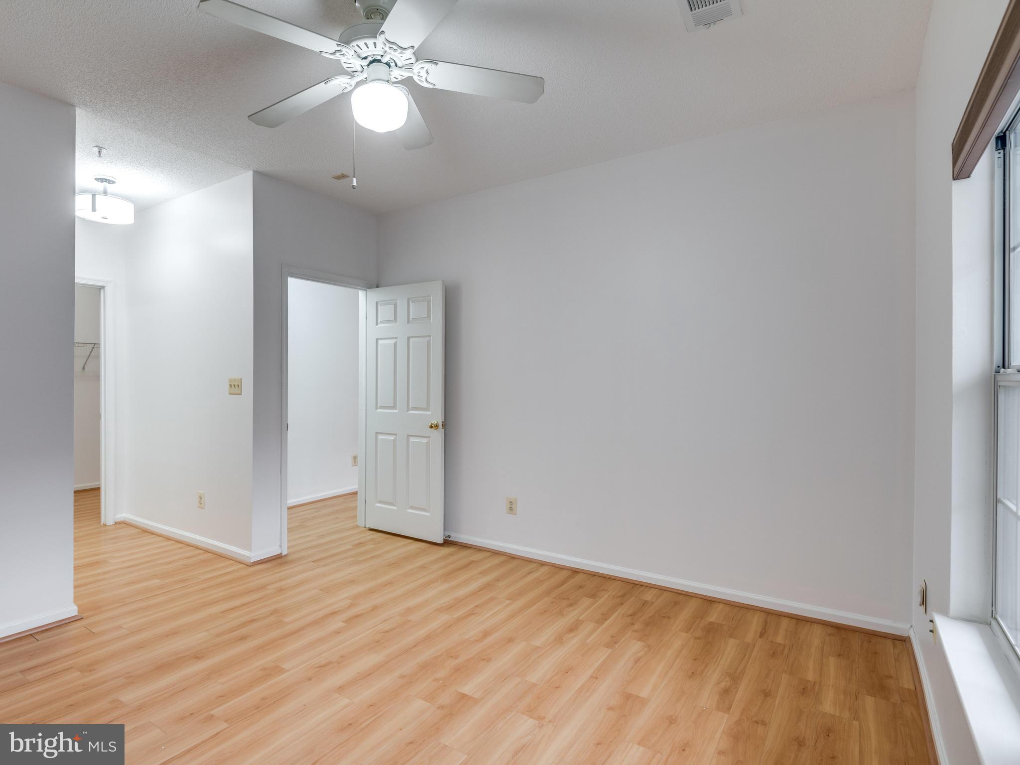 1701 Lake Shore Crest Drive, Unit 34 Reston, VA 20190 - Photo 15 of 28 a view of empty room with wooden floor