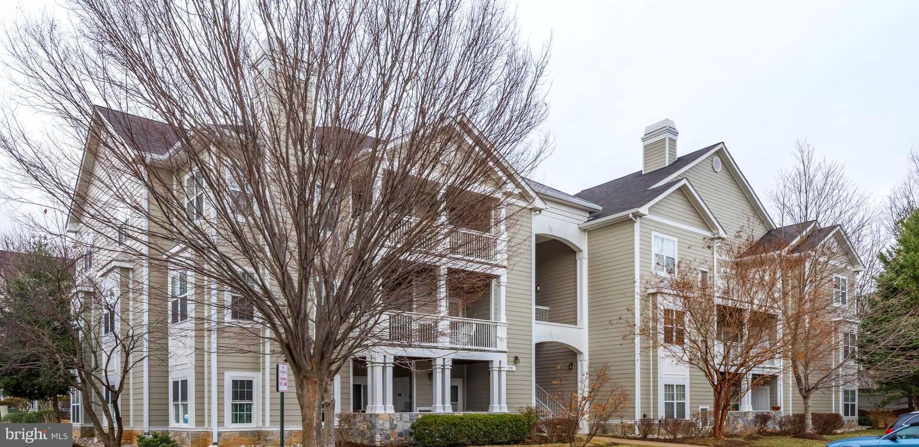 1701 Lake Shore Crest Drive, Unit 34 Reston, VA 20190 - Photo 27 of 28 front view of a building