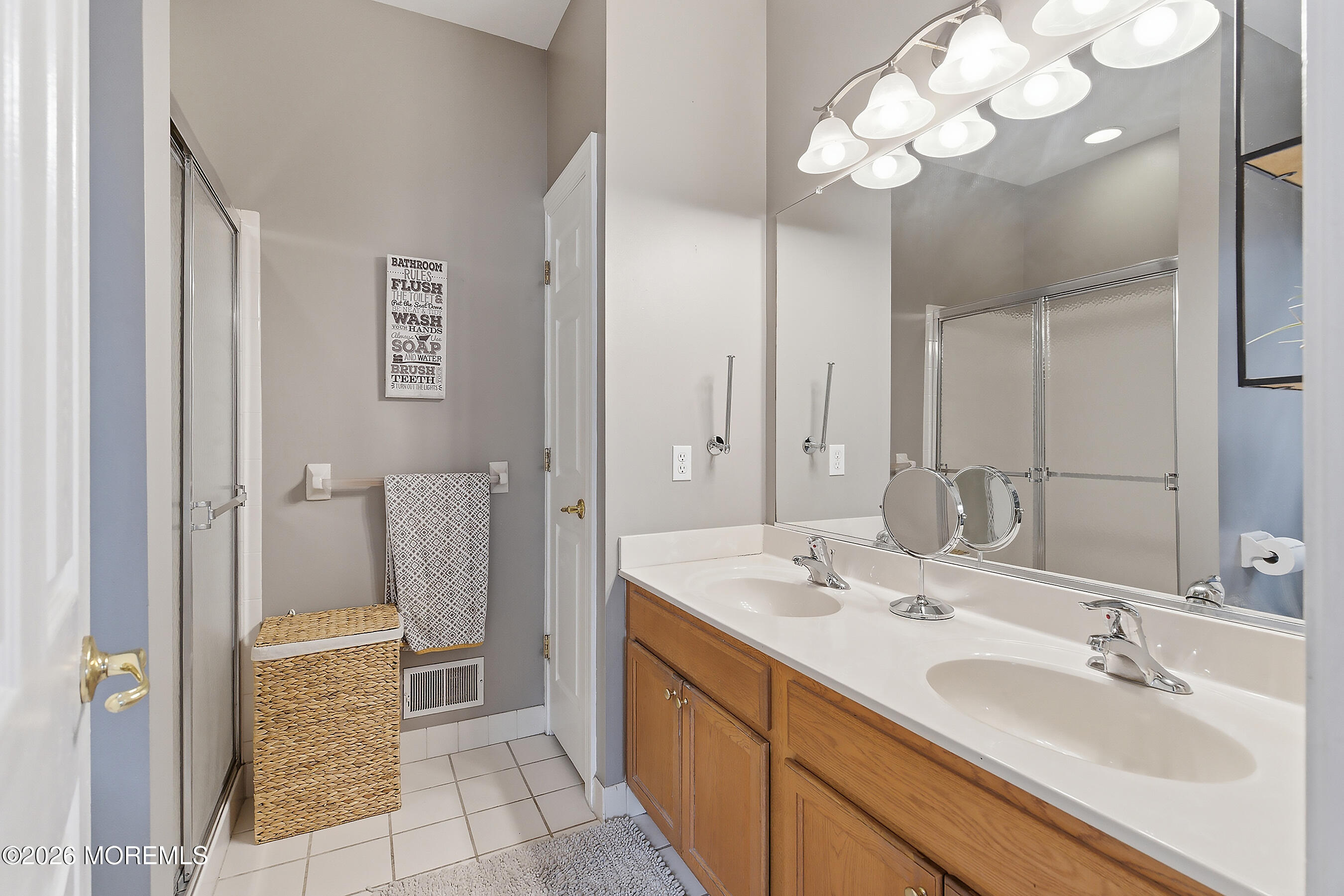 23 Little Leaf Lane Howell, NJ 07731 - Photo 23 of 37 a spacious bathroom with a double vanity sink mirror and toilet