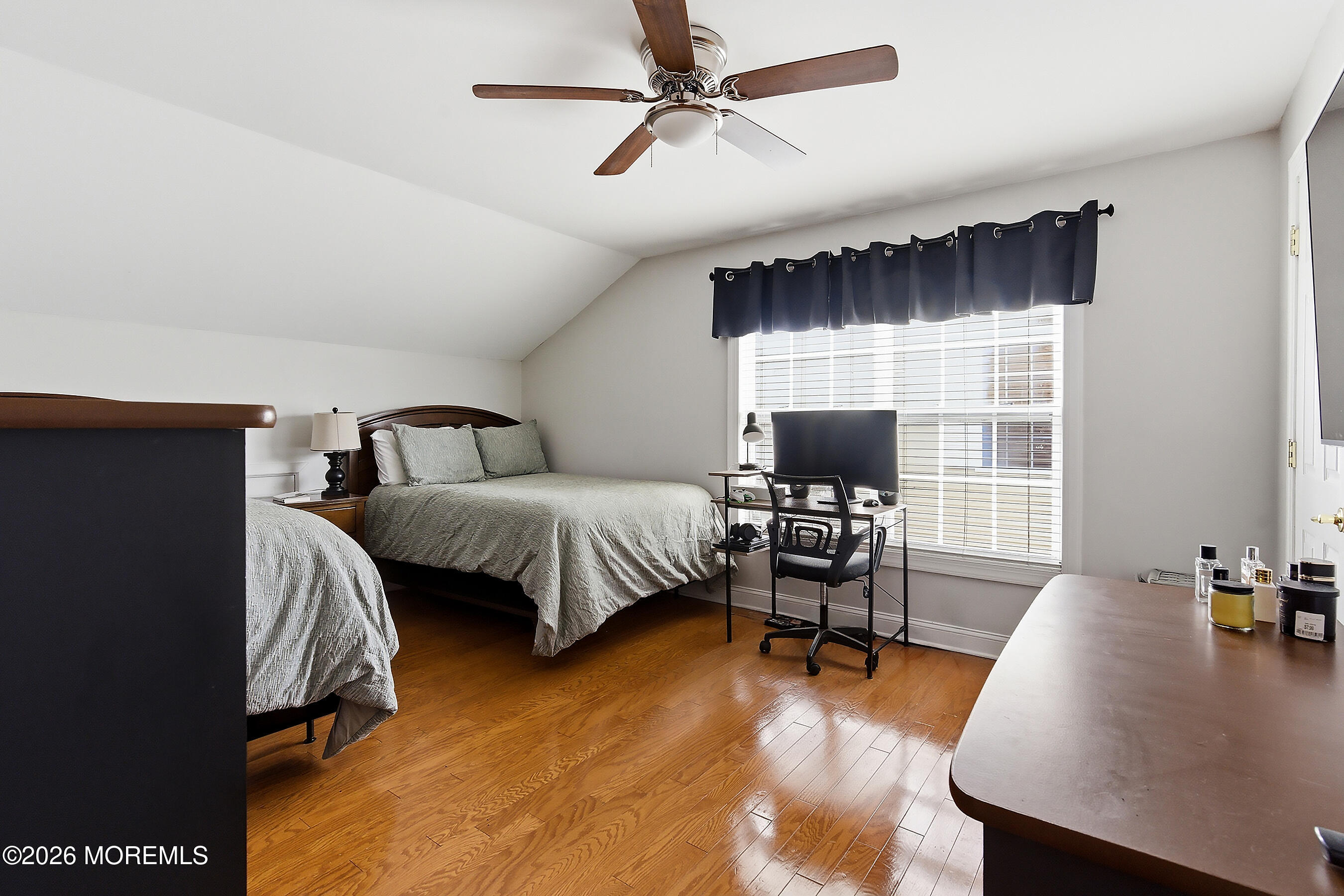 23 Little Leaf Lane Howell, NJ 07731 - Photo 25 of 37 a bedroom with a bed and a chair