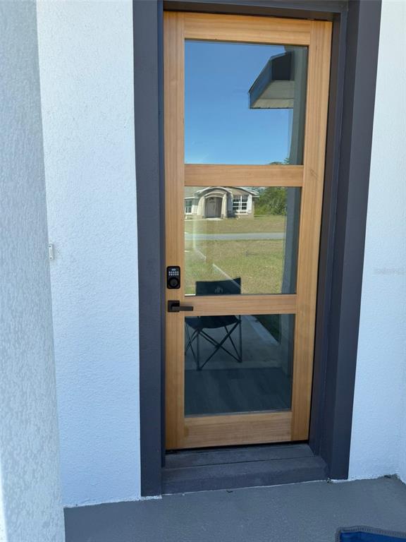 17490 Southwest 27th Circle Ocala, FL 34473 - Photo 2 of 12 a closeup of a door with a door