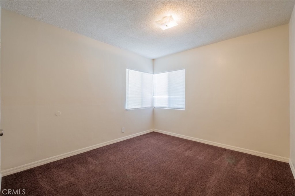 342 East Lancaster Boulevard Lancaster, CA 93535 - Photo 12 of 15 an empty room with windows
