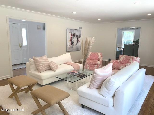 244 Stanwich Road Greenwich, CT 06830 - Photo 11 of 22 a living room with furniture and wooden floor