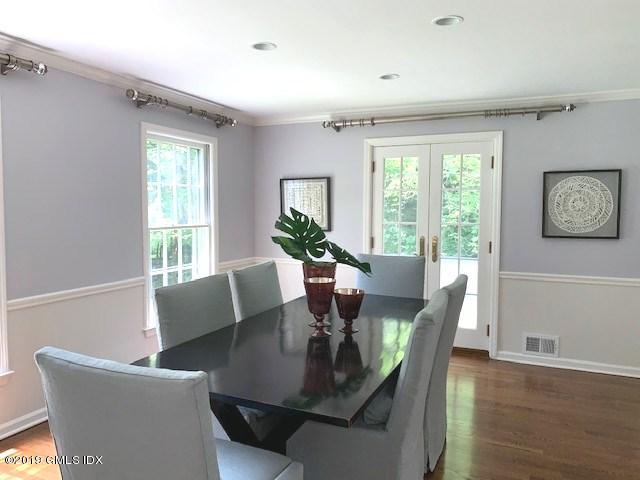 244 Stanwich Road Greenwich, CT 06830 - Photo 12 of 22 a view of a dining room with furniture window and wooden floor