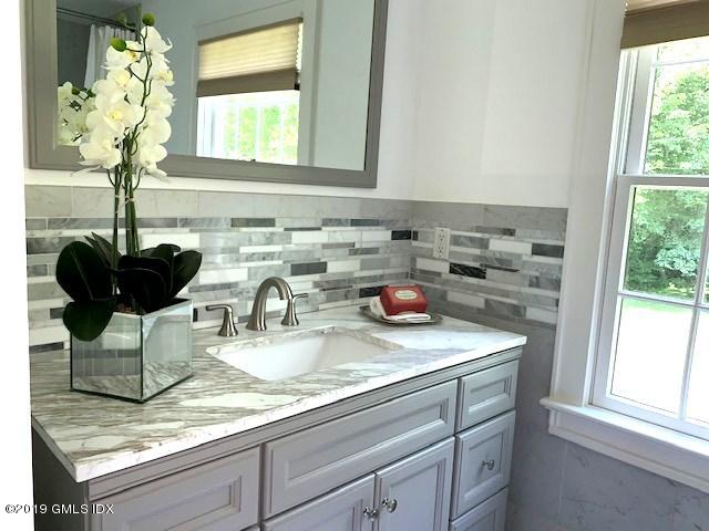 244 Stanwich Road Greenwich, CT 06830 - Photo 17 of 22 a kitchen with a sink and a window