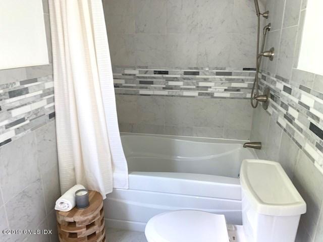244 Stanwich Road Greenwich, CT 06830 - Photo 18 of 22 a bathroom with a toilet and a bathtub