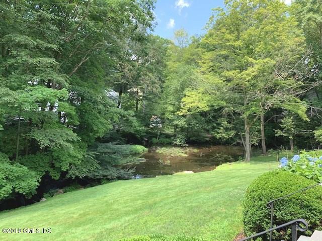 244 Stanwich Road Greenwich, CT 06830 - Photo 21 of 22 a view of a yard with a tree