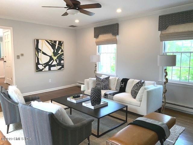 244 Stanwich Road Greenwich, CT 06830 - Photo 9 of 22 a living room with furniture a window and a table