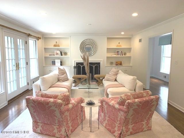 244 Stanwich Road Greenwich, CT 06830 - Photo 10 of 22 a living room with fireplace furniture and a large window