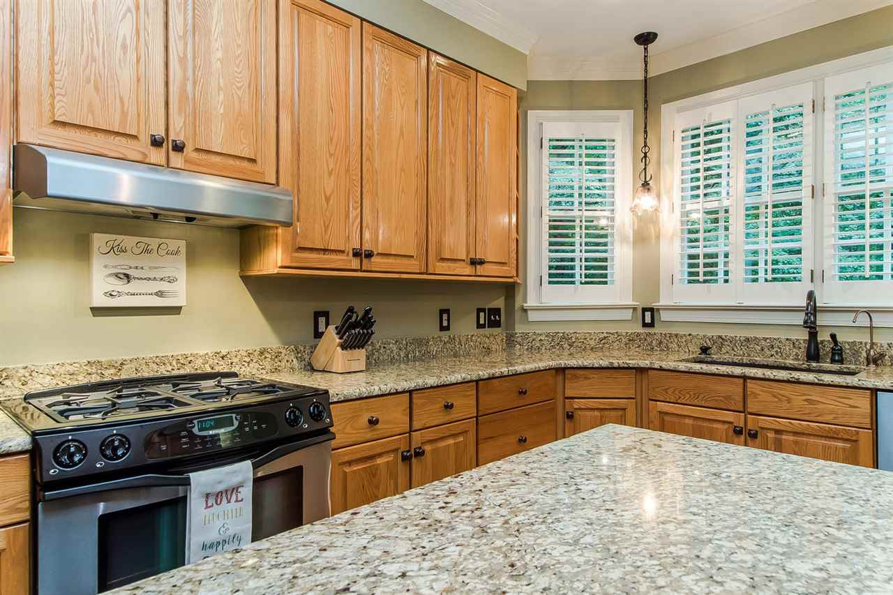 820 Tadlock Drive Raleigh, NC 27614 - Photo 10 of 25 gas stove, oil rubbed bronze fixtures and stainless steel appliances Kitchen