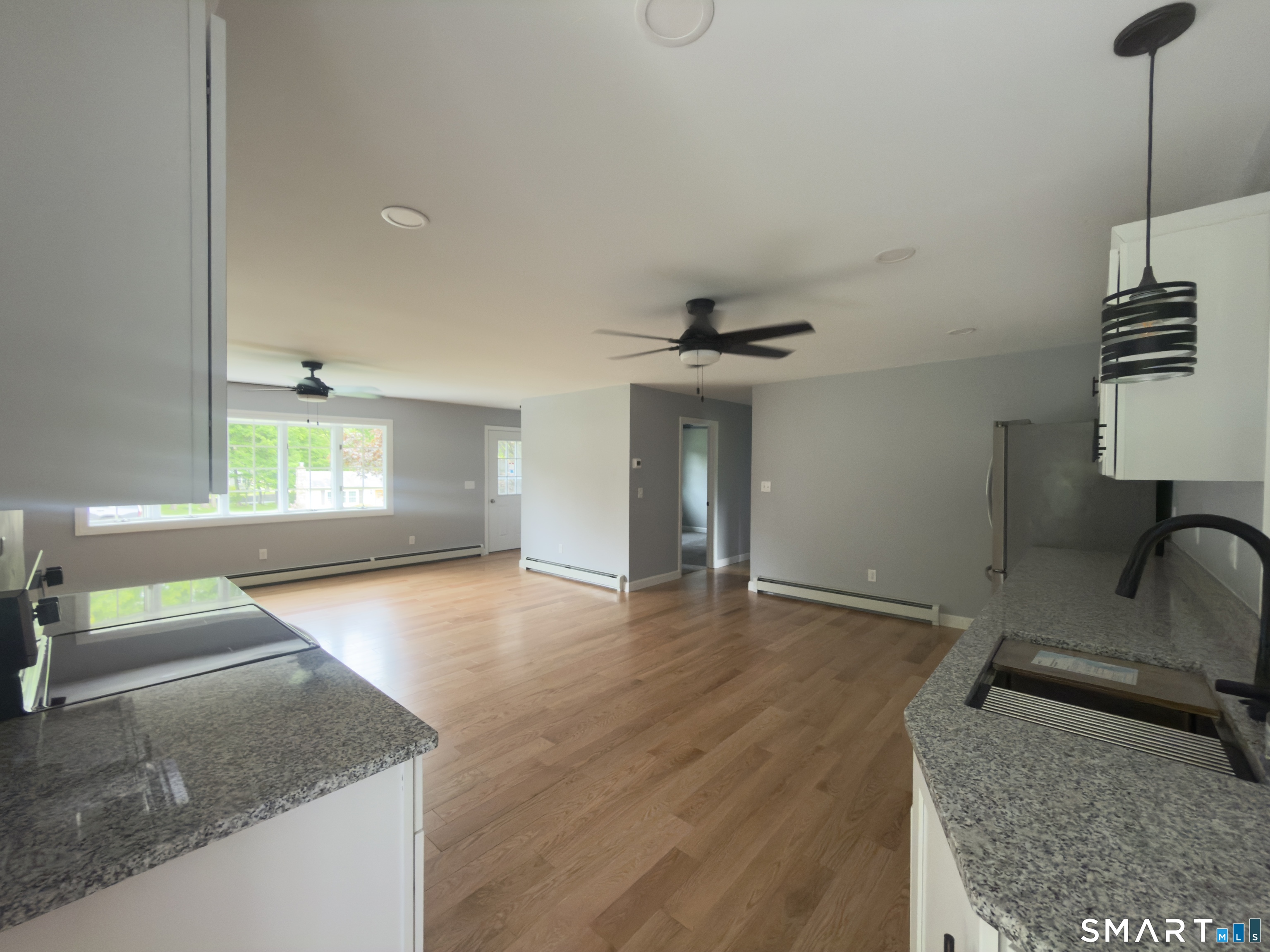44 Polly Avenue Killingly, CT 06239 - Photo 15 of 22 a view of a hallway with furniture and a window