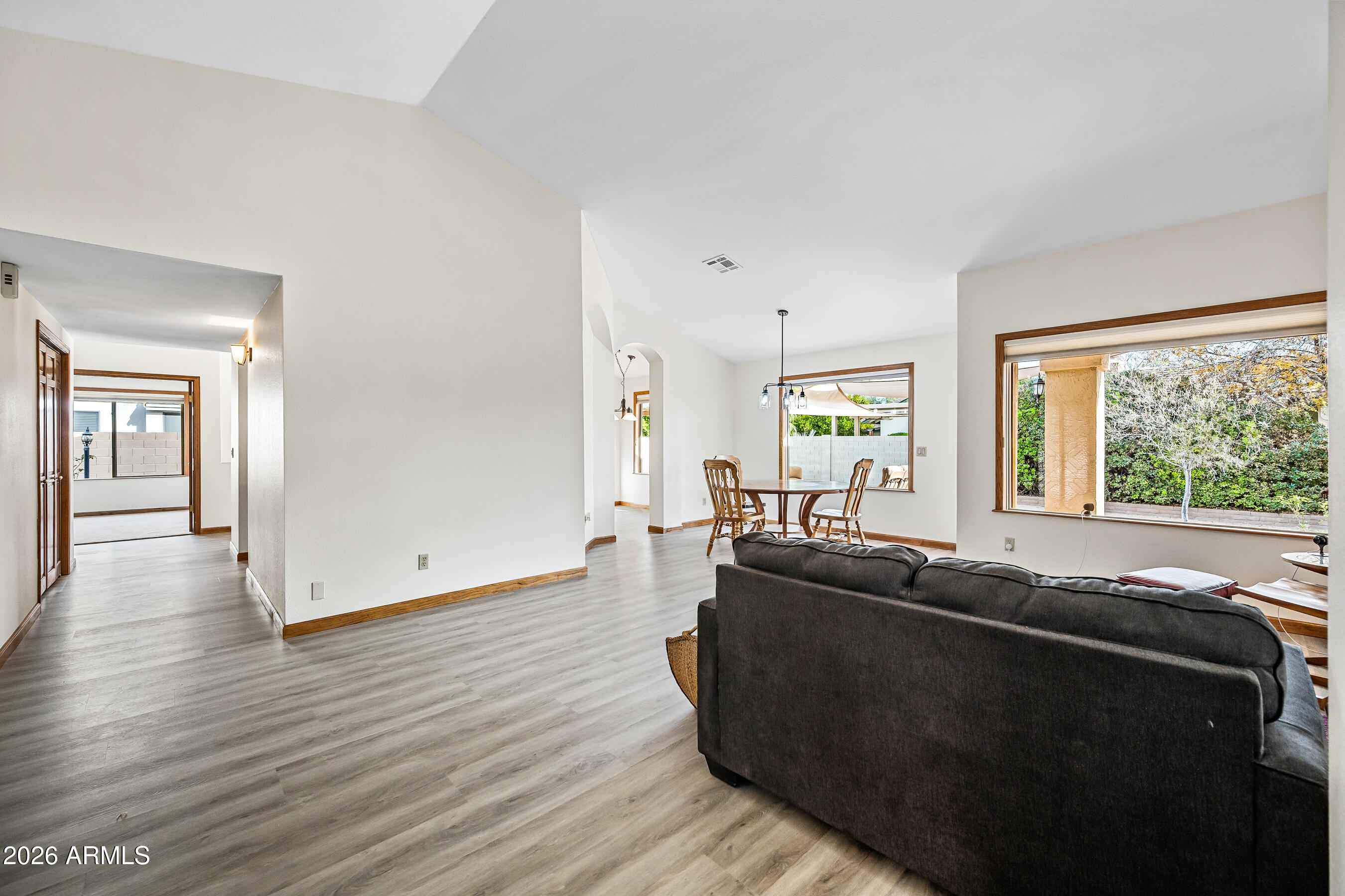 7833 South Terrace Road Tempe, AZ 85284 - Photo 12 of 39 a living room with furniture and wooden floor