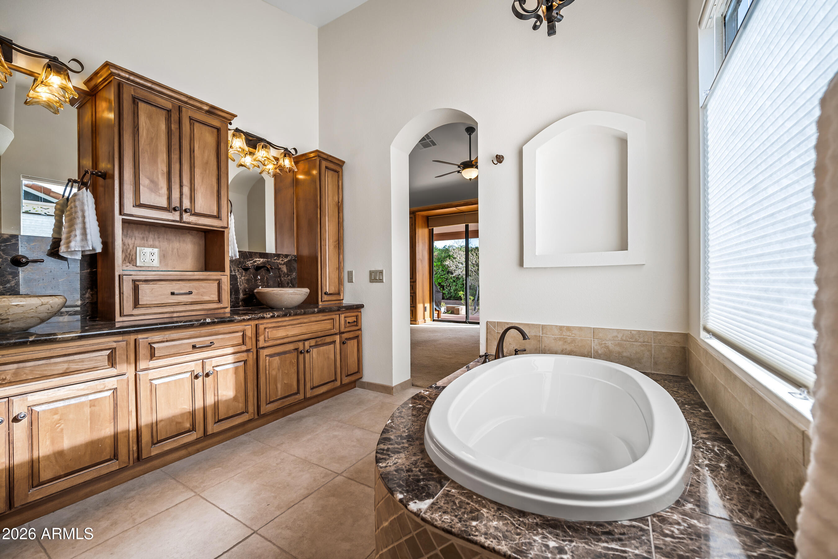 7833 South Terrace Road Tempe, AZ 85284 - Photo 17 of 39 a spacious bathroom with a granite countertop sink and a mirror