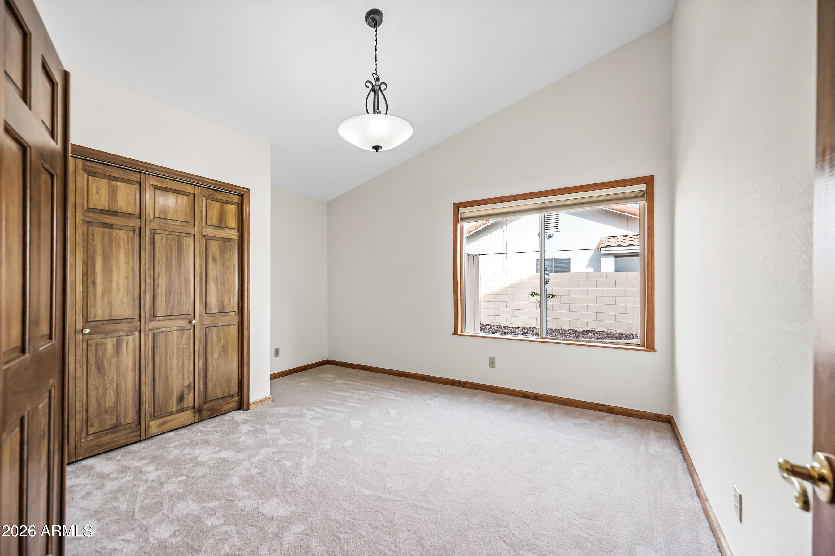 7833 South Terrace Road Tempe, AZ 85284 - Photo 22 of 39 an empty room with windows and closet