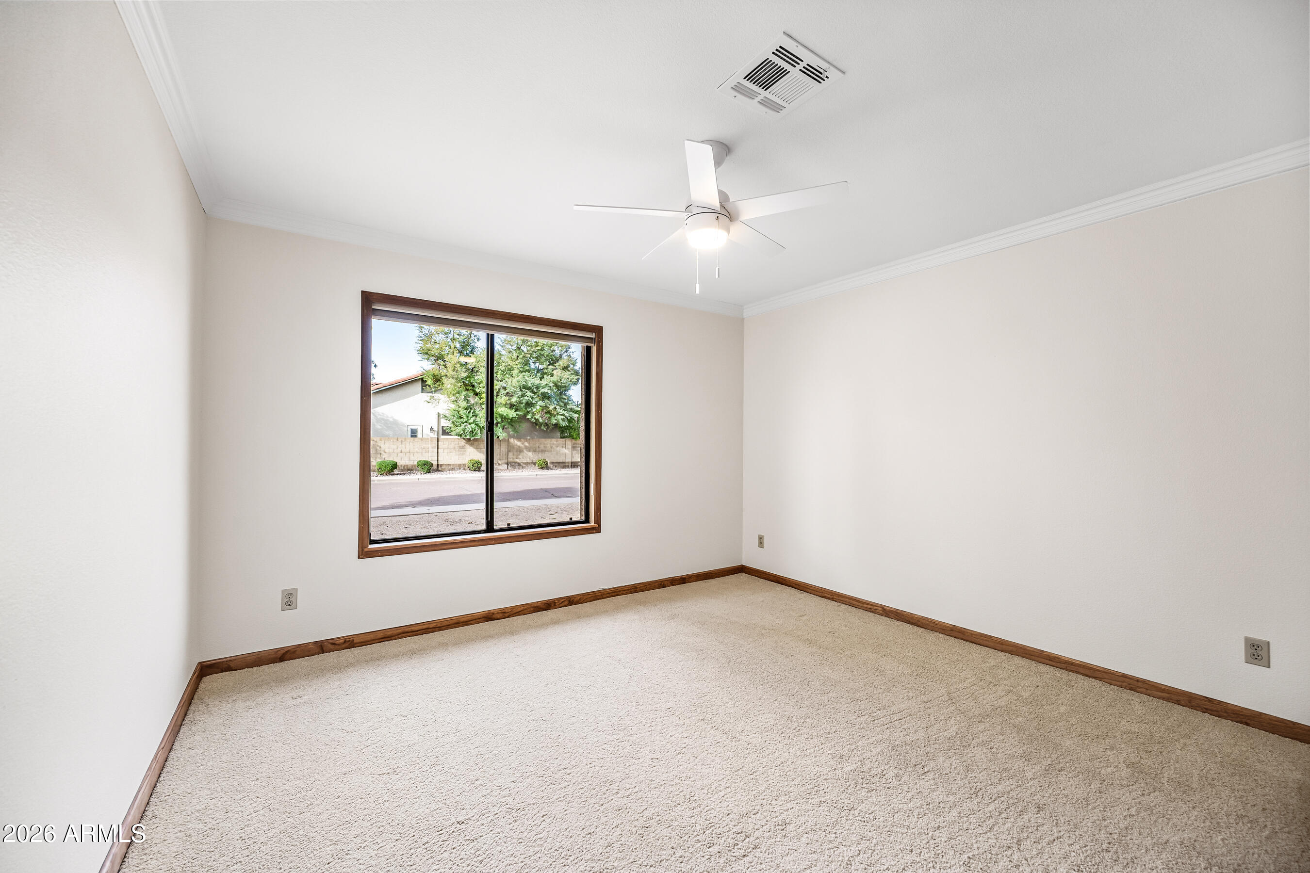 7833 South Terrace Road Tempe, AZ 85284 - Photo 23 of 39 an empty room with a window and ceiling fan