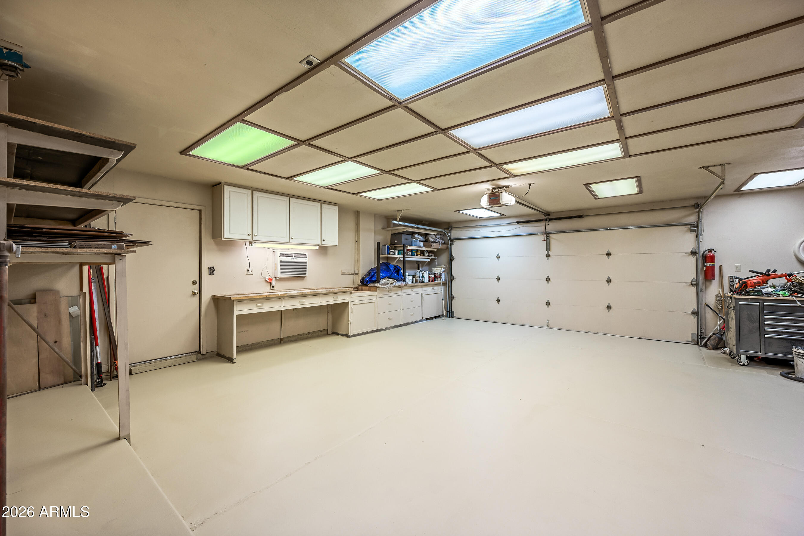 7833 South Terrace Road Tempe, AZ 85284 - Photo 30 of 39 a view of a storage & utility room with stainless steel appliances