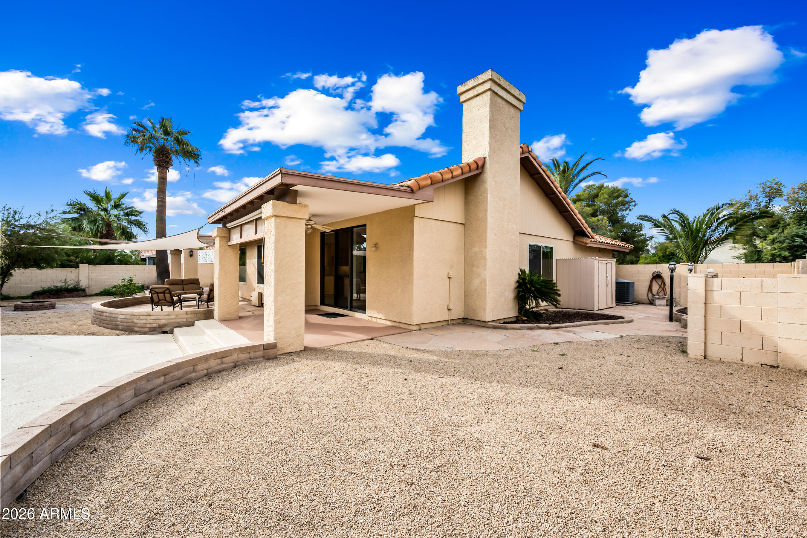 7833 South Terrace Road Tempe, AZ 85284 - Photo 35 of 39 a view of a house with a patio