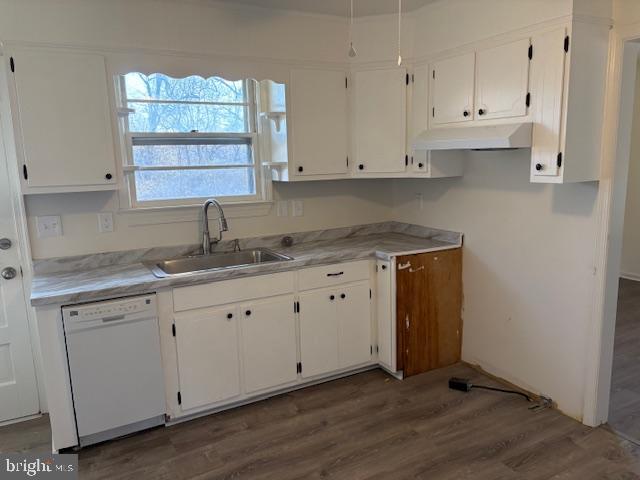 12020 Middlebrook Road Germantown, MD 20874 - Photo 12 of 34 a kitchen with granite countertop white cabinets white appliances and sink