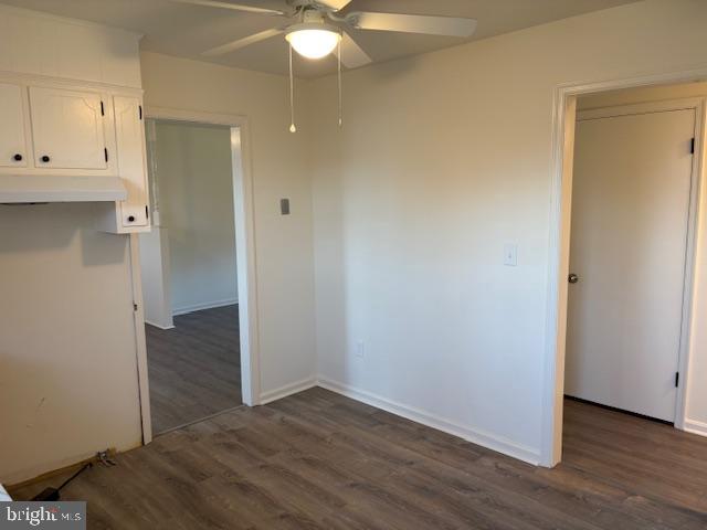 12020 Middlebrook Road Germantown, MD 20874 - Photo 15 of 34 an empty room with wooden floor and fan