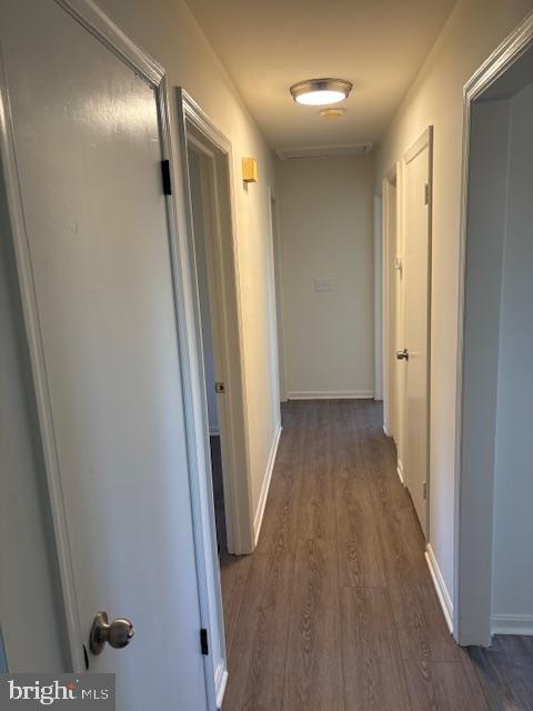 12020 Middlebrook Road Germantown, MD 20874 - Photo 20 of 34 a view of hallway with wooden floor