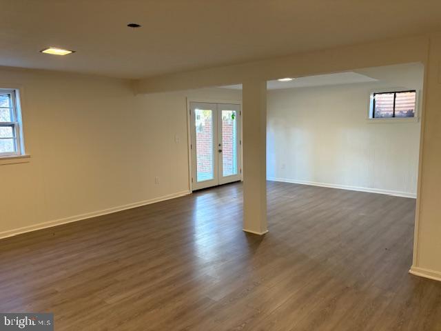 12020 Middlebrook Road Germantown, MD 20874 - Photo 21 of 34 an empty room with wooden floor and windows