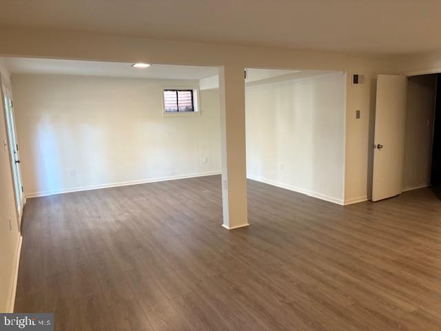 12020 Middlebrook Road Germantown, MD 20874 - Photo 22 of 34 a view of a livingroom with wooden floor