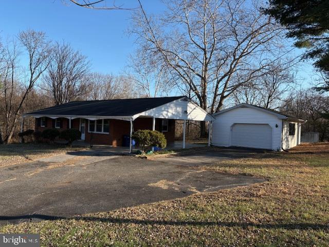 12020 Middlebrook Road Germantown, MD 20874 - Photo 3 of 34 a view of a house with a yard
