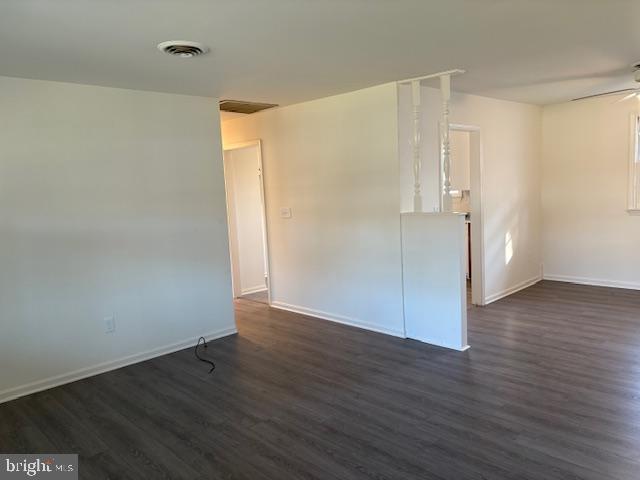 12020 Middlebrook Road Germantown, MD 20874 - Photo 8 of 34 a view of an empty room with wooden floor