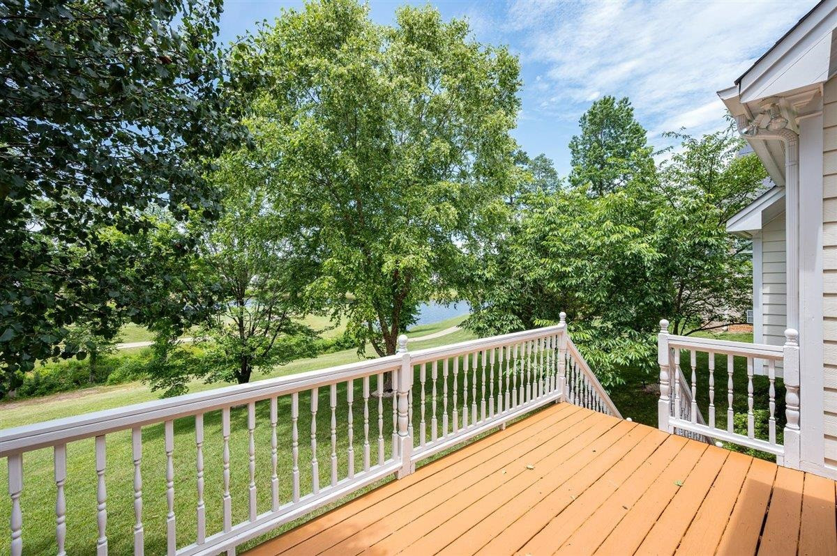 545 Competition Road Raleigh, NC 27603 - Photo 27 of 40 Views of the 18th fairway. Enjoy the views and the beauty of the Japanese Cherry and Bradford Pear trees from your back deck. Yard
